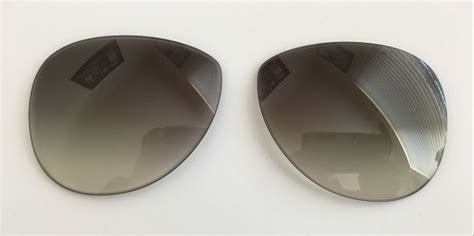 prada lens replacement